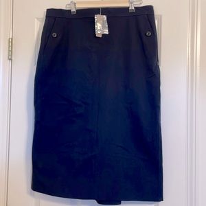 J.Crew Navy skirt with flattering flounce in back.